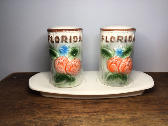 Hand Painted Florida Souvenir Salt & Pepper Shakers With Plate. Made in Japan. Great Condition. Bright Colors. Embossed Surface
