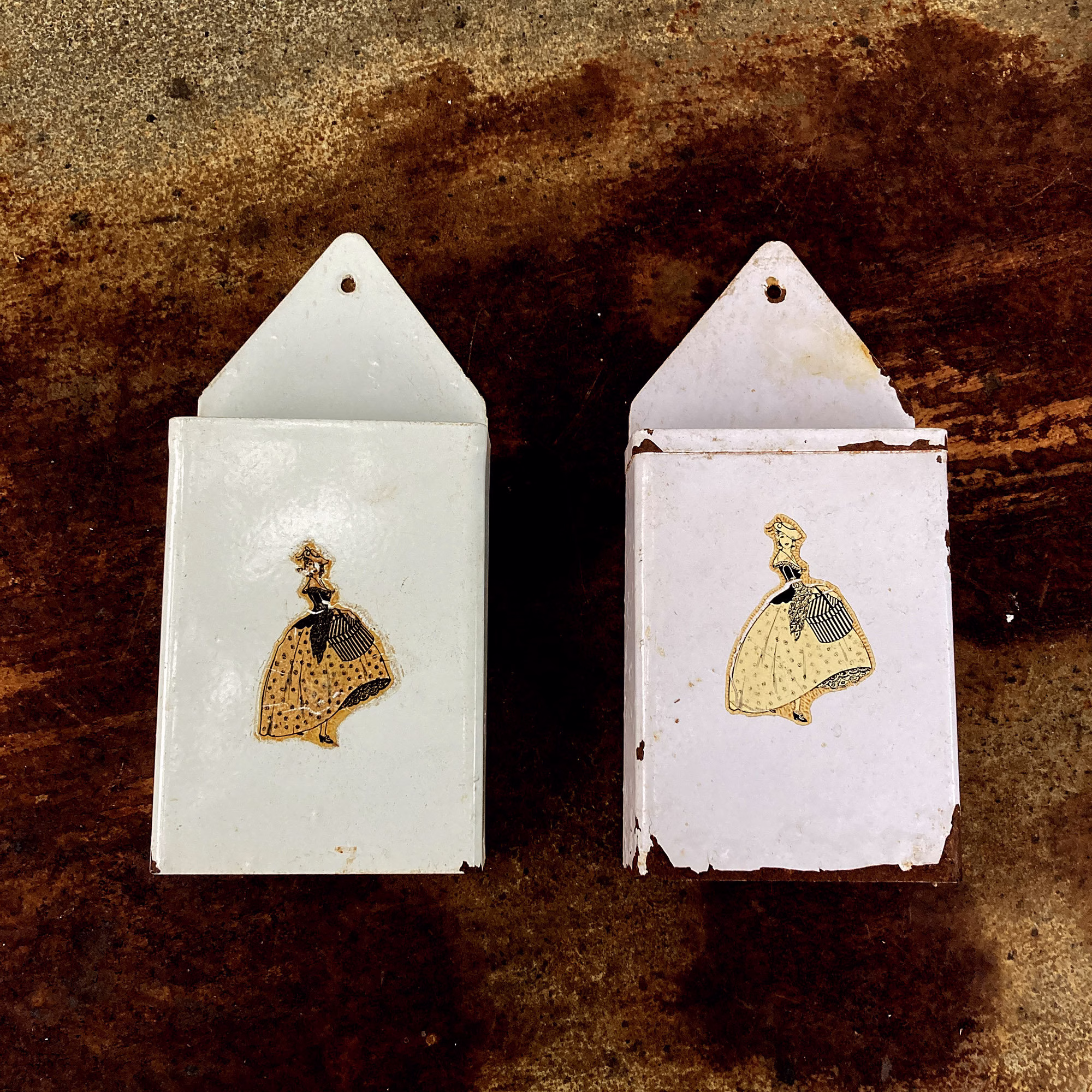 2 X Enamel Vintage Pose Pot Wall Hangs, Some Age Wear But With Figurine Motif Print