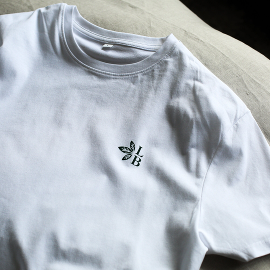 White Basic Chest Logo Organic Cotton T-Shirt. Eco Friendly Sustainable Fashion. Soft & Comfy