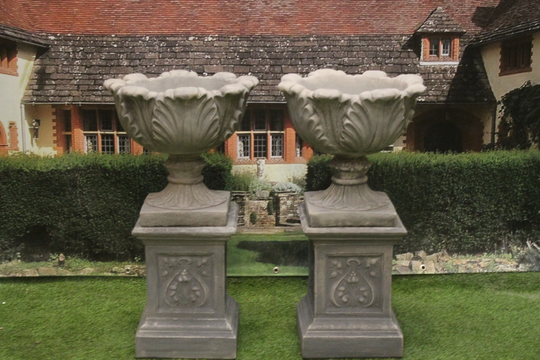Pair Of Tulip Urns On Sherwood Plinths