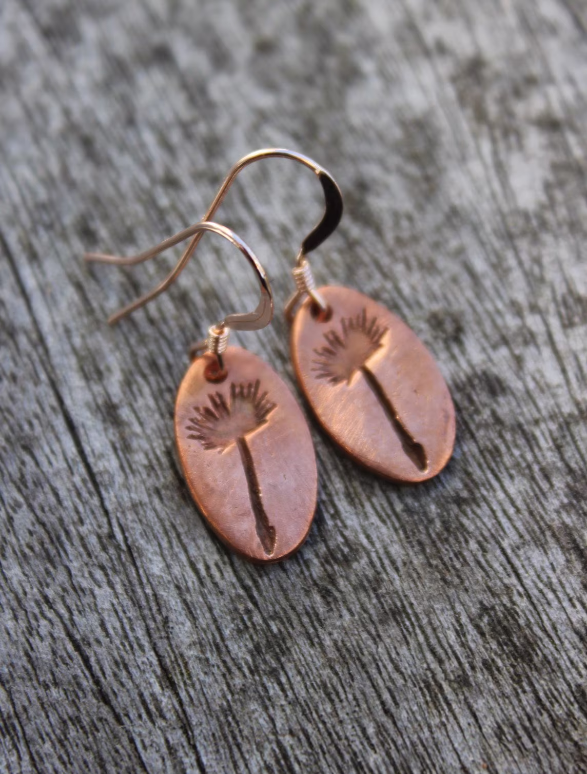 Seed Print Drop Earrings With A Dandelion Clock Embossed On Each Earring. These Pretty Copper Hang From Rose Gold Wires