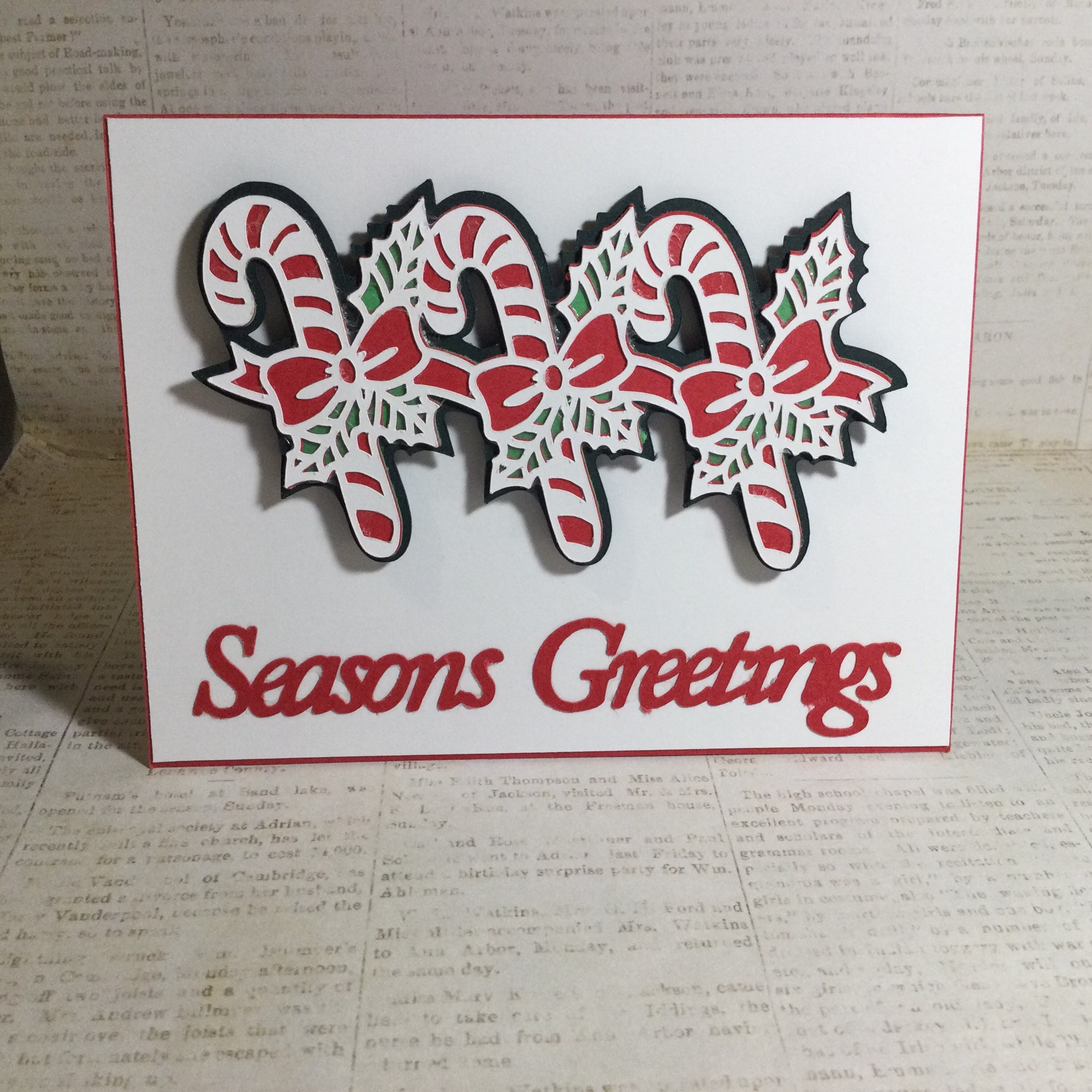 3-D Seasons Greetings Candy Cane Handmade Christmas Greeting Card. Comes in A Set Of 12. Sentiment Inside Card