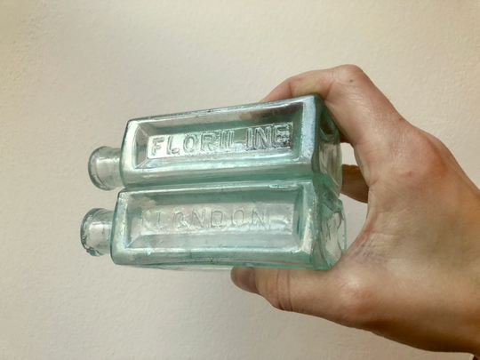 Pair Of Embossed Floriline London Bottles