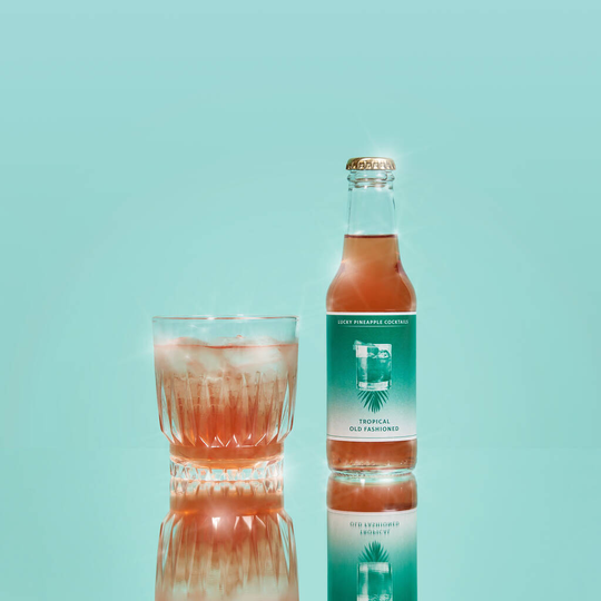 Tropical Old Fashioned Cocktail With Garnishes