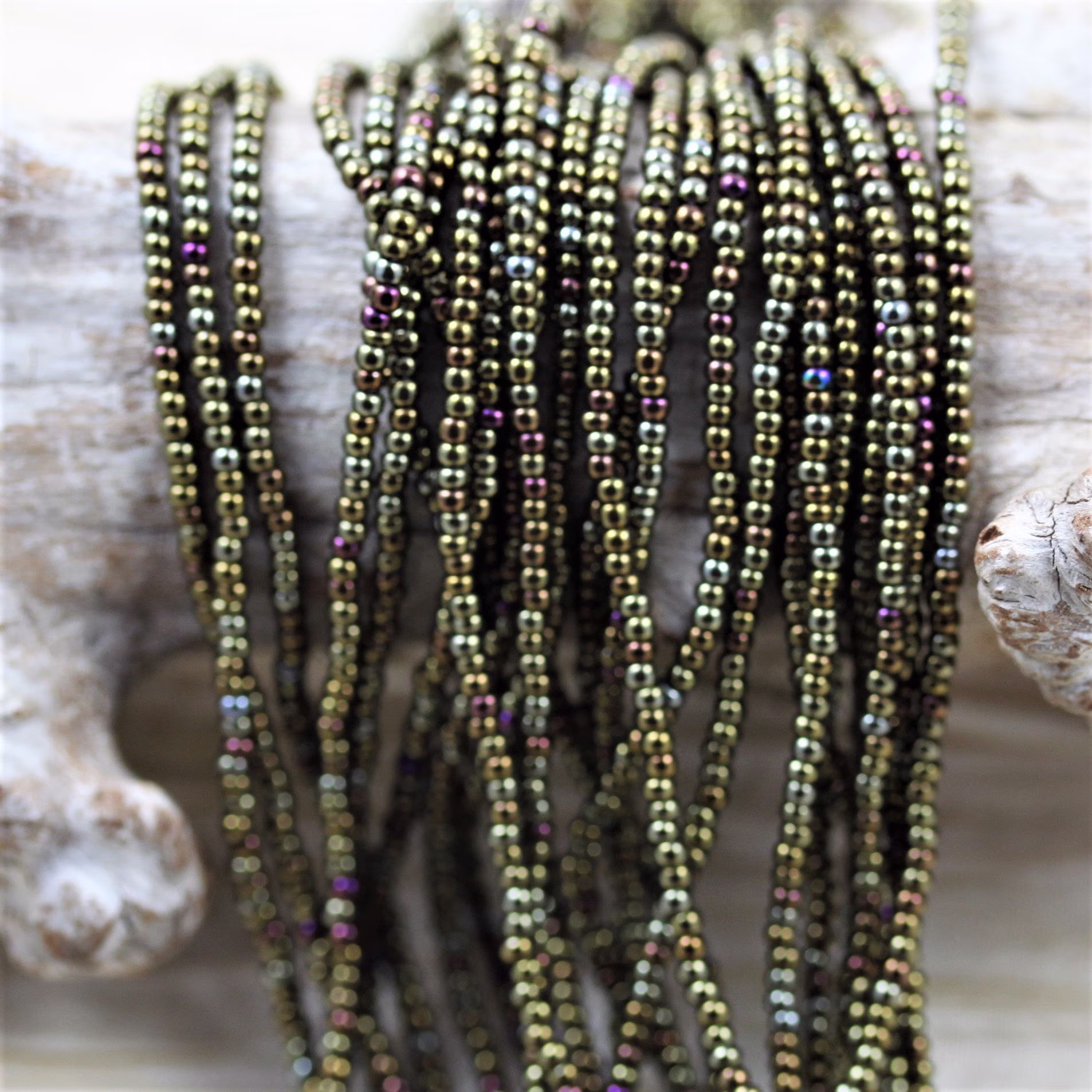 11/0 Brown Iris Czech Seed Beads - 12/20