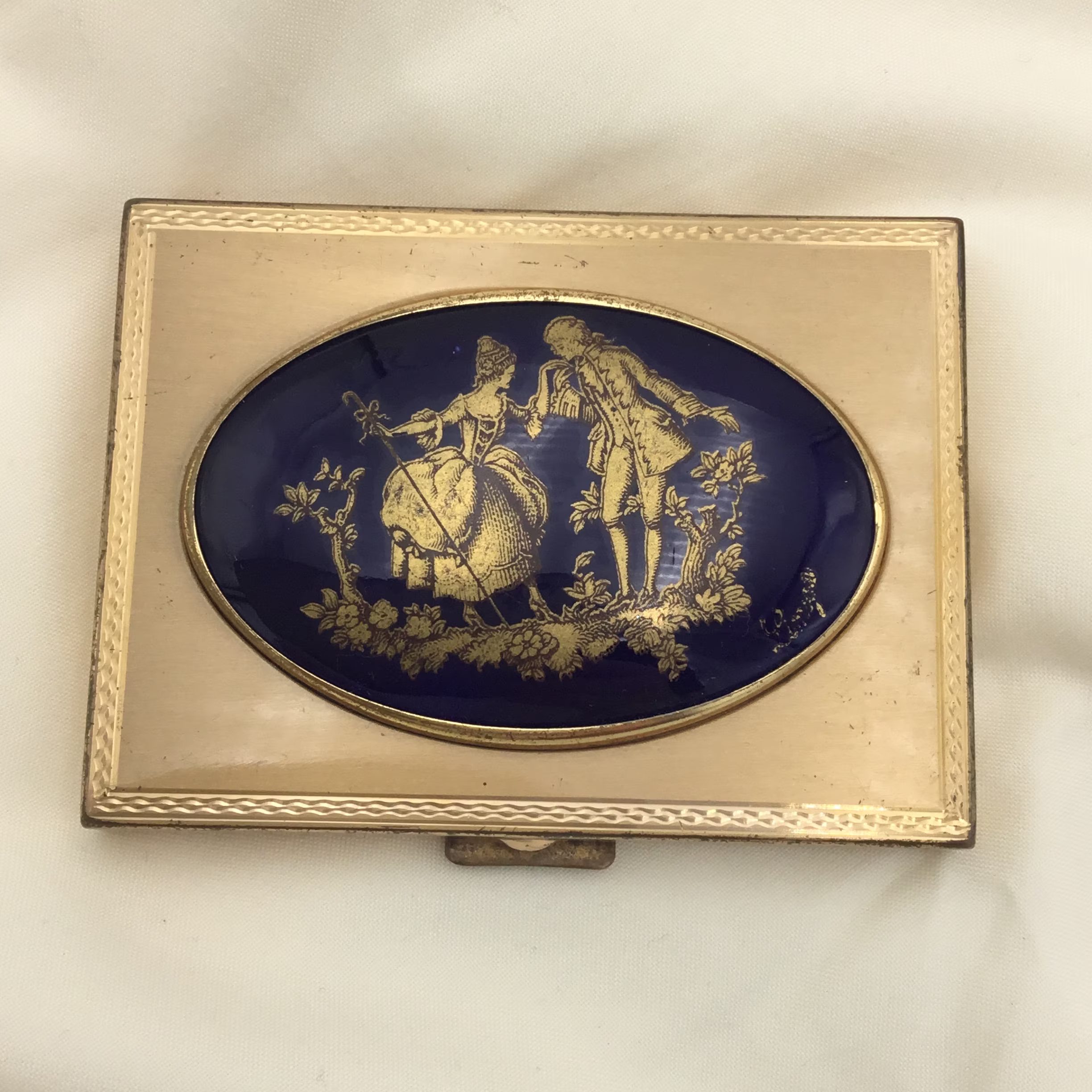 Vintage 1960S Signed Limoges Blue Porcelain Courting Couple Gold Tone Rectangular Powder Compact Complete With Sieve. Size 8cm X 6cm